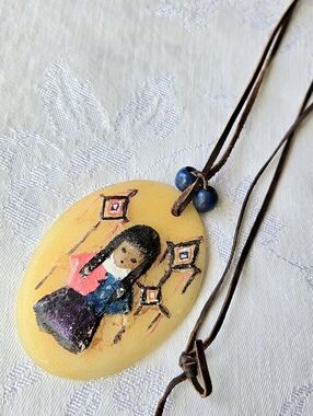 Ted DeGrazia hand-painted resin pendant necklace with Native American child
